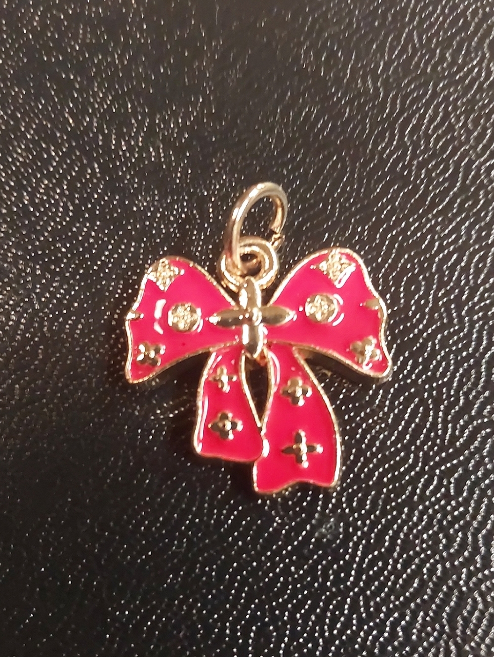 Gold-Tone Pink Enamel Bow Pendant Necklace